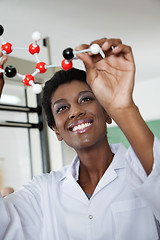 Image showing Female Teacher Examining Molecular Structure