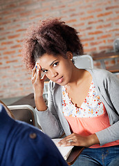 Image showing Student Thinking While Giving Test In Classroom