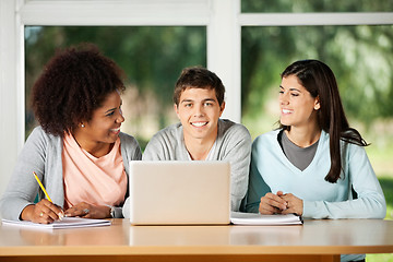 Image showing Happy Man With Laptop In Classroom