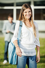 Image showing University Student Carrying Shoulder Bag Standing On Campus