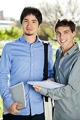 Image showing Students With Books Standing On College Campus