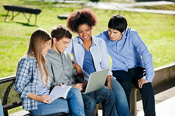 Image showing College Students Using Laptop In Campus