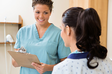 Image showing Nurse Looking At Patient In Ultrasound Room