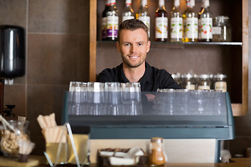 Image showing Smart Male Bartender At Counter In Cafe