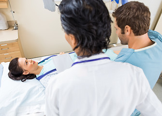 Image showing Nurse And Doctor Preparing Patient For Xray