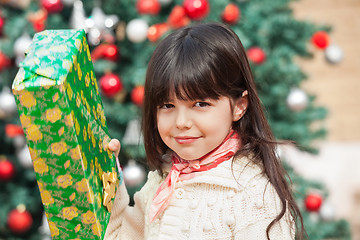 Image showing Girl Holding Christmas Present