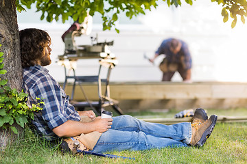 Image showing Carpenter Taking a Break