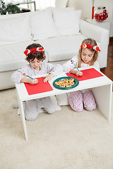 Image showing Siblings Making Christmas Greeting Cards