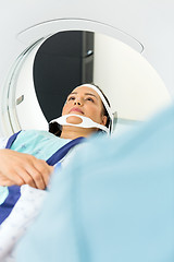 Image showing Patient Undergoing CT Scan In Examination Room