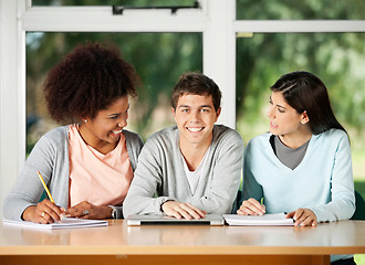 Image showing Student With Classmates Looking At Each Other In Classroom