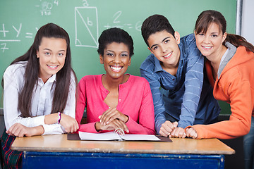 Image showing Teacher With Teenage Students In Classroom