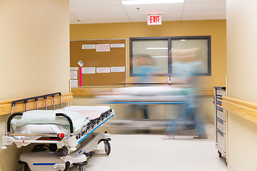 Image showing Nurses Walking In Hospital Corridor