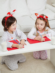 Image showing Siblings Writing Letters To Santa Claus