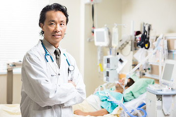 Image showing Confident Doctor With Patient Resting In Hospital