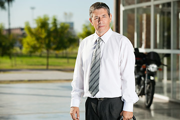 Image showing Teacher Looking Away While At College Campus