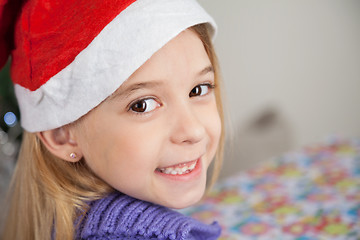 Image showing Happy Girl Wearing Santa Hat