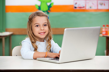 Image showing Girl Using Laptop In Classroom