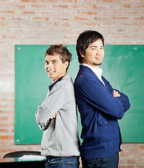 Image showing Students Standing Arms Crossed In Classroom