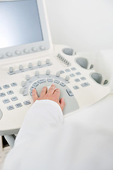 Image showing Obstetrician Using Ultrasound Machine