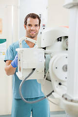 Image showing Nurse Preparing Xray Machine