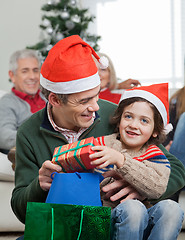 Image showing Son And Father With Christmas Presents