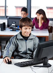 Image showing Schoolboy Using Computer In Lab