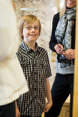 Image showing Smiling Boy Wearing Glasses In Store