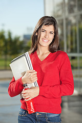 Image showing Student With Books And Juice Bottle At University Campus