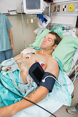 Image showing Patient With Holter Monitor Sleeping In Examination Room