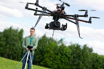 Image showing Technician Operating UAV Octocopter