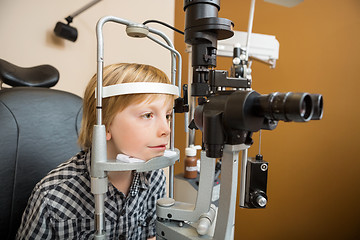 Image showing Boy Undergoing Eye Examination With Slit Lamp