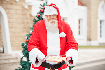 Image showing Santa Claus Offering Cookies