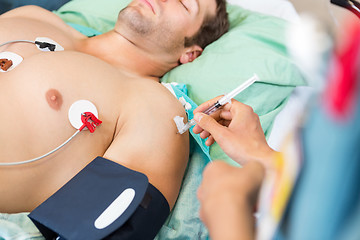 Image showing Nurse Injecting Syringe On Patient's Arm In Hospital