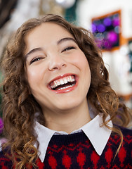 Image showing Woman Laughing In Christmas Store