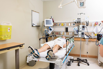 Image showing Patient Lying On Bed In Hospital Room