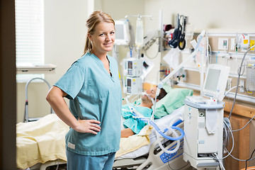 Image showing Confident Nurse With Patient Resting In Hospital