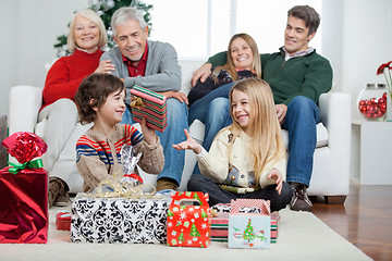 Image showing Family With Christmas Presents At Home