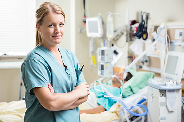 Image showing Confident Nurse With Patient Resting In Hospital