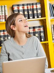 Image showing Student With Laptop Looking Away In University Library