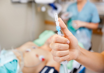 Image showing Nurse Holding Syringe In Hospital