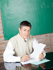 Image showing Professor at Desk