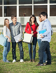 Image showing Happy Students Standing On College Campus