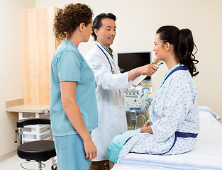 Image showing Doctor Examining Patient In Ultrasound Room