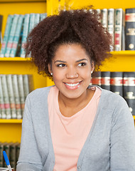 Image showing Woman Looking Away While Smiling In University Library