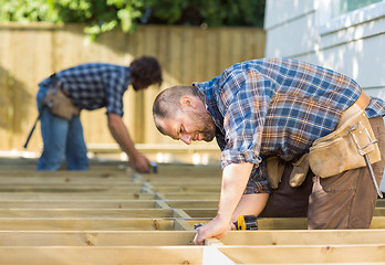 Image showing Carpenters Working At Construction Site