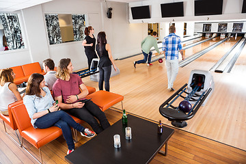 Image showing People Having Leisure Time At Bowling Club