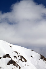 Image showing Winter mountains and sky with clouds at sun day