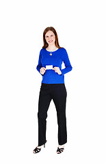 Image showing Woman holding business card.