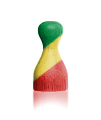 Image showing Wooden pawn with a painting of a flag