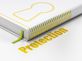 Image showing Safety concept: book Keyhole, Protection on white background